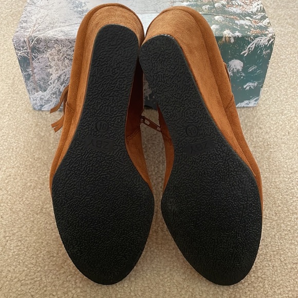 Never worn fawn  wedge bootie with zipper and braid details. - Picture 3 of 8